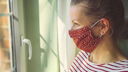 Woman wearing colorful facemask