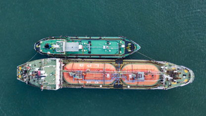 Crude oil and LNG tanker ships park in sea