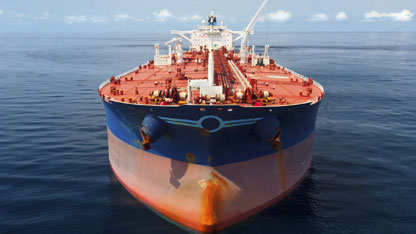 Aerial photo of a large oil tanker floating in calm seas