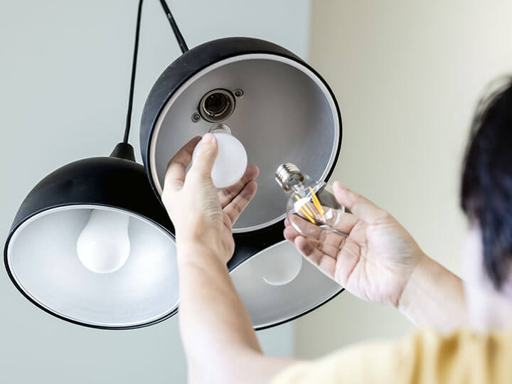 Man changing lightbulb