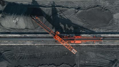 Aerial shot of train car loading coal